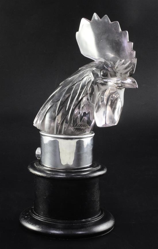Tête de Coq/Cocks Head. A glass mascot by René Lalique, introduced on 3/2/1928, No.1137 Height 21cm with mount, 29.5cm overall.